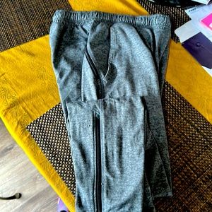 Men’s medium Adidas joggers with zip closures